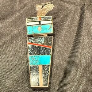 Larry M Chavez Navajo sterling High grade turquoise, Coral yei pendant